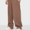 Kaotiko Unisex Jogger - Pantaloni Sportivi - Brown -Kaotiko Negozio Di Abbigliamento Alla Moda 111dbe49526e47f79204462ded035195